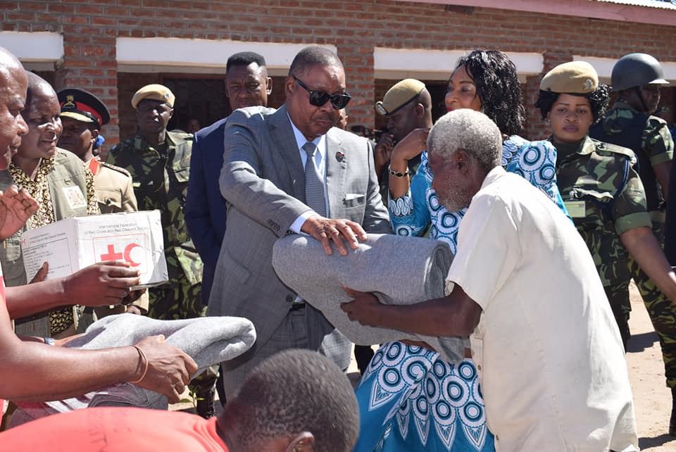 Peter Mutharika serving flood victims