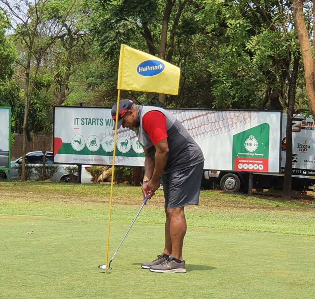 Saulos Chilima playing Golf