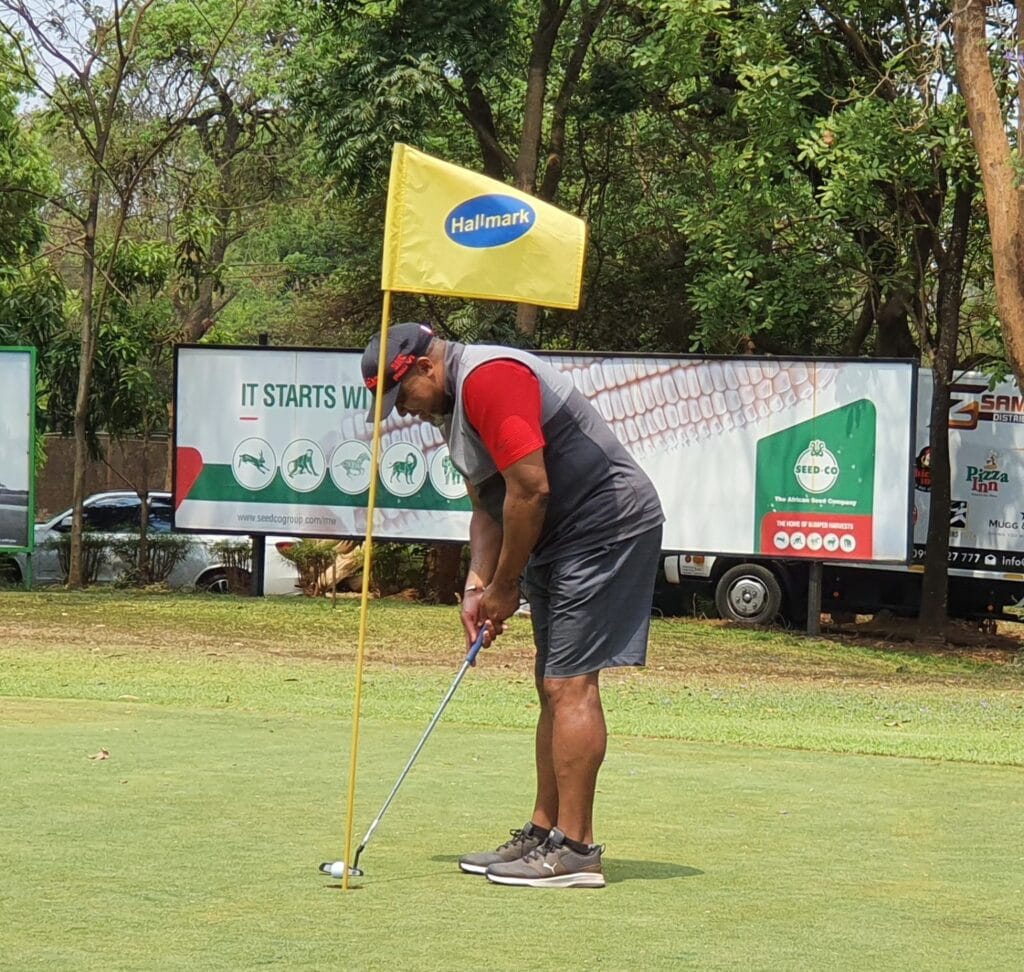 Saulos Chilima playing Golf