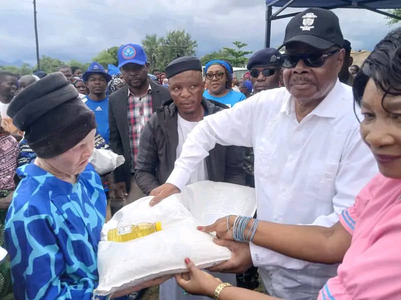 Peter Mutharika donates flour to 300 families in Mangochi